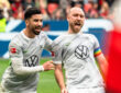 Mohamed Amoura und Christian Eriksen